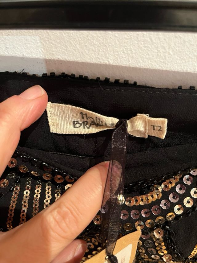 Falda de lentejuelas negra y dorada