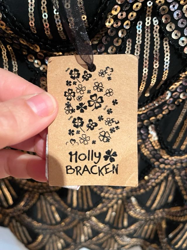 Falda de lentejuelas negra y dorada