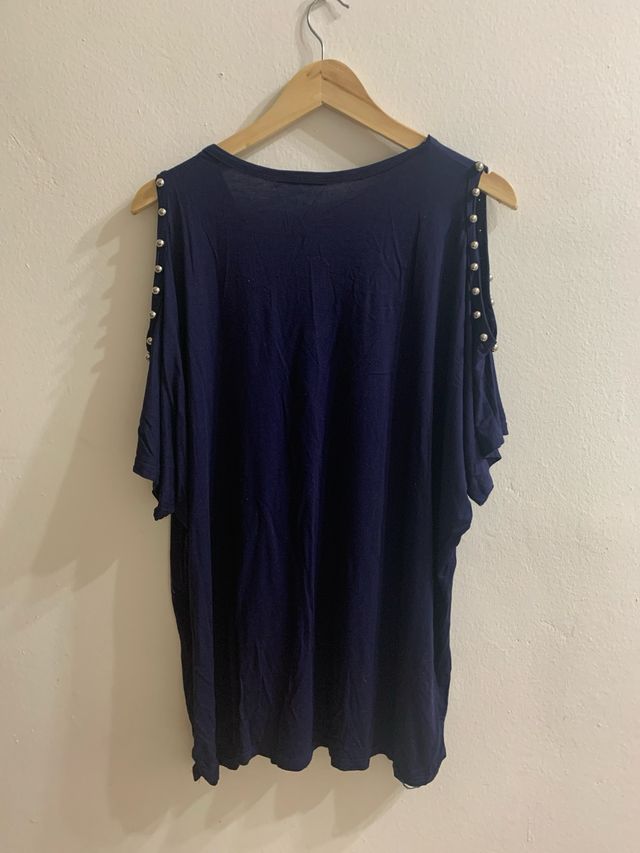 Camiseta azul con estampado de elefantes