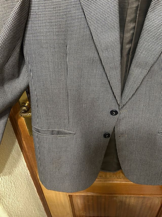 Americana hombre gris