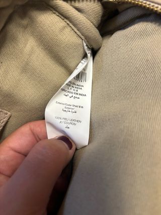 Bolso de piel beige con flecos Amichi