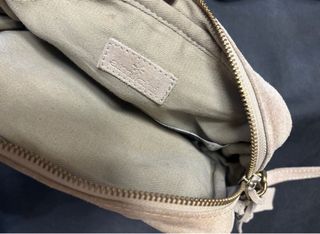 Bolso de piel beige con flecos Amichi
