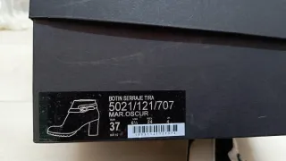 Botines de piel marrón con hebilla