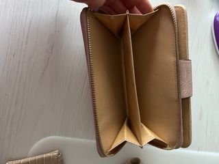 Cartera de mano beige y rosa