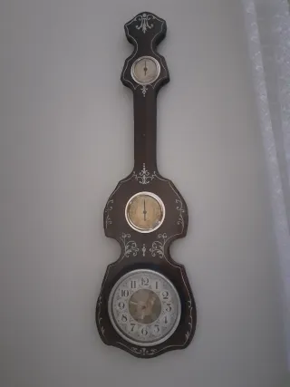 Orologio da parete antico in legno