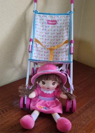 Cochecito de muñecas rosa y blanco