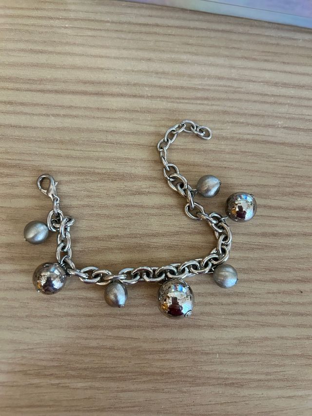 Pulsera de plata con charms