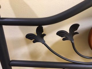 Cabezal forja de 90 con detalles florales