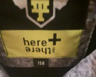 Anorak gris here+there talla 158 ,equivale 12-13 a