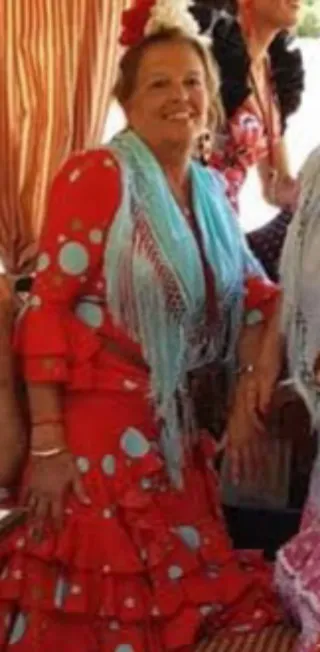 Traje de flamenca verde con volantes