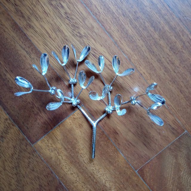 Vischio decorativo in metallo argentato