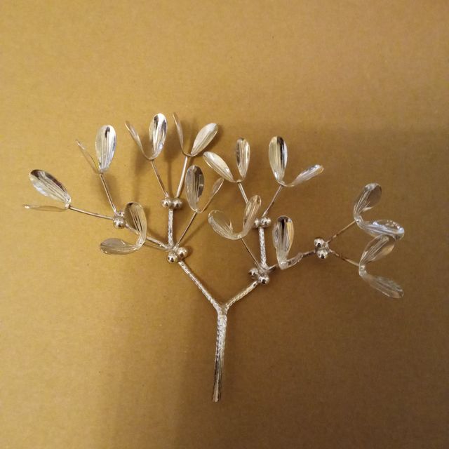 Vischio decorativo in metallo argentato