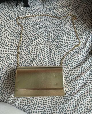 Bolso de mano dorado