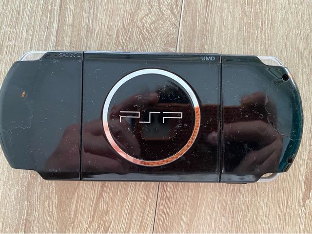 PSP Slim Sony Negra parte trasera con Marcas