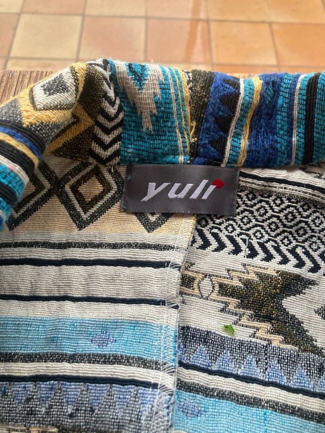 Chaqueta estilo étnico con flecos