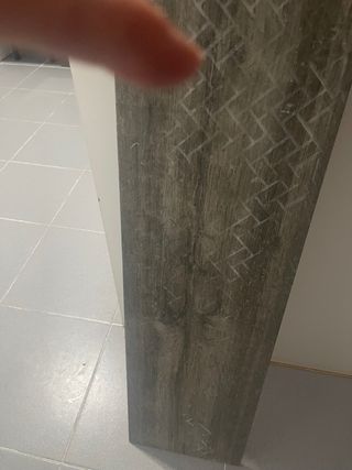 Porcelanico grises ,largo 129x23 hay 85 placas