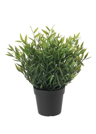 Planta artificial decorativa en maceta negra
