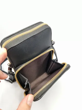 Bolso bandolera de dos compartimentos.
