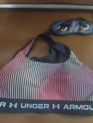 Top deportivo Under Armour rayas rosa
