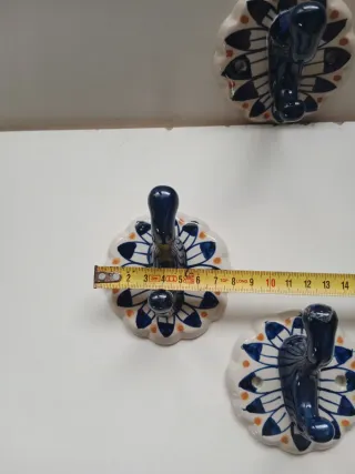 4 Perchas de cerámica decoradas