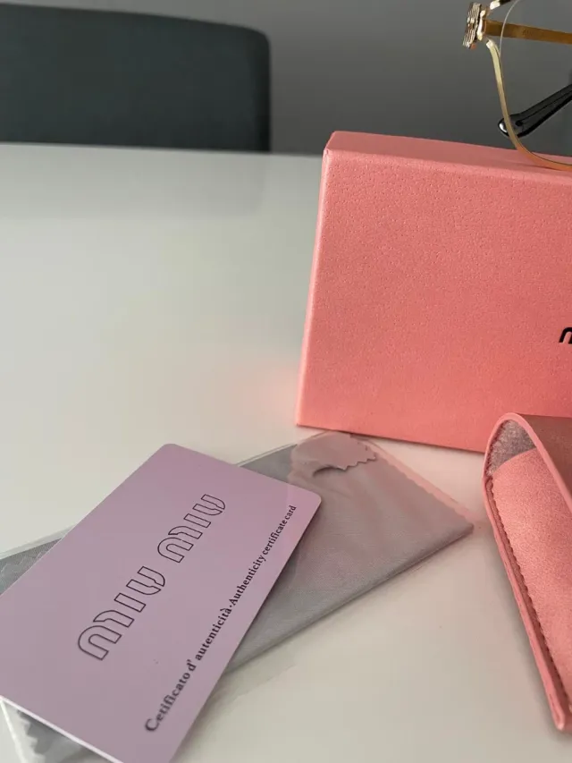 Gafas Miu Miu Doradas y Rosas