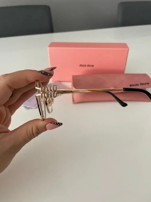 Gafas Miu Miu Doradas y Rosas