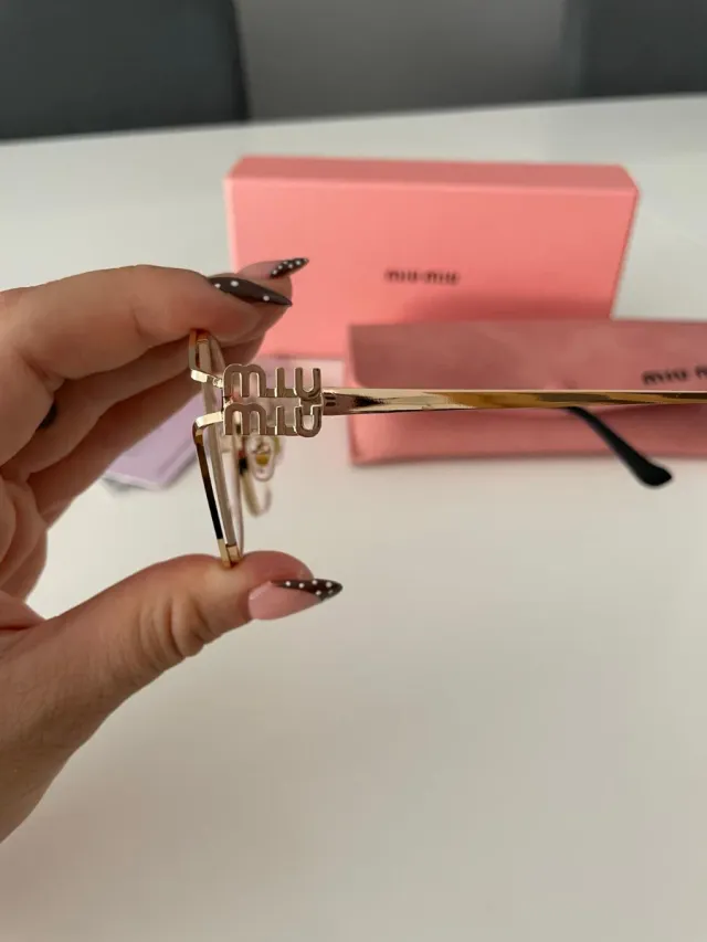 Gafas Miu Miu Doradas y Rosas