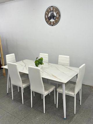 Mesa de comedor de cristal con 6 sillas