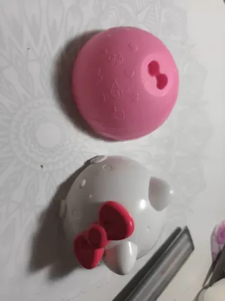 Muñeca LOL Hello Kitty Pompompurin