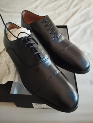 Zapatos de cordones de piel negros