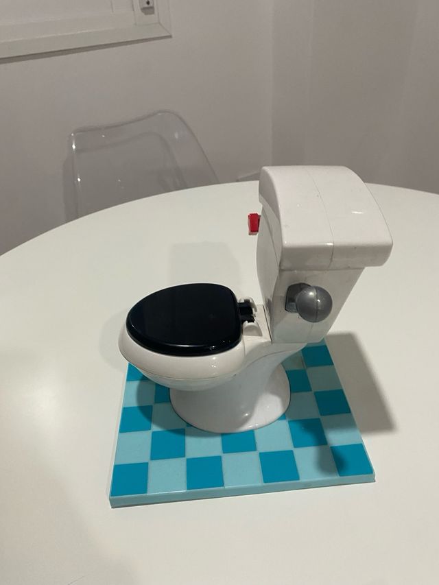 Juego de váter con rollo de papel