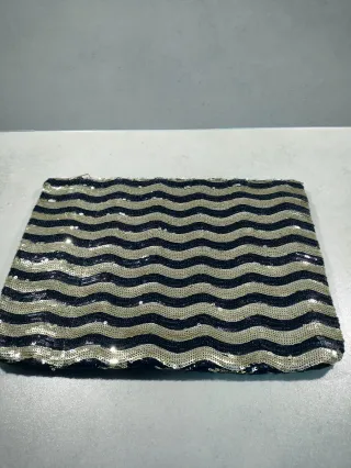 Bolso de fiesta lentejuelas negro y dorado