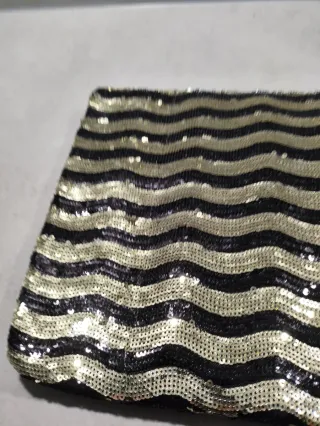 Bolso de fiesta lentejuelas negro y dorado