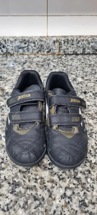 Zapatillas multitaco Joma negras y doradas