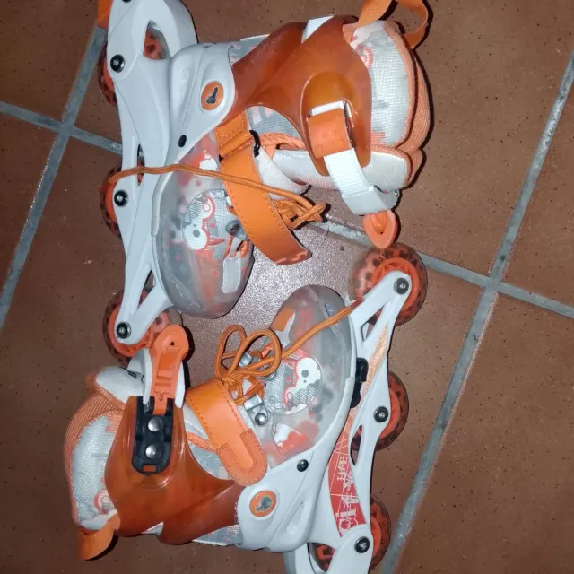 Patines infantiles ajustables naranja talla 26-29