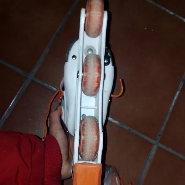 Patines infantiles ajustables naranja talla 26-29