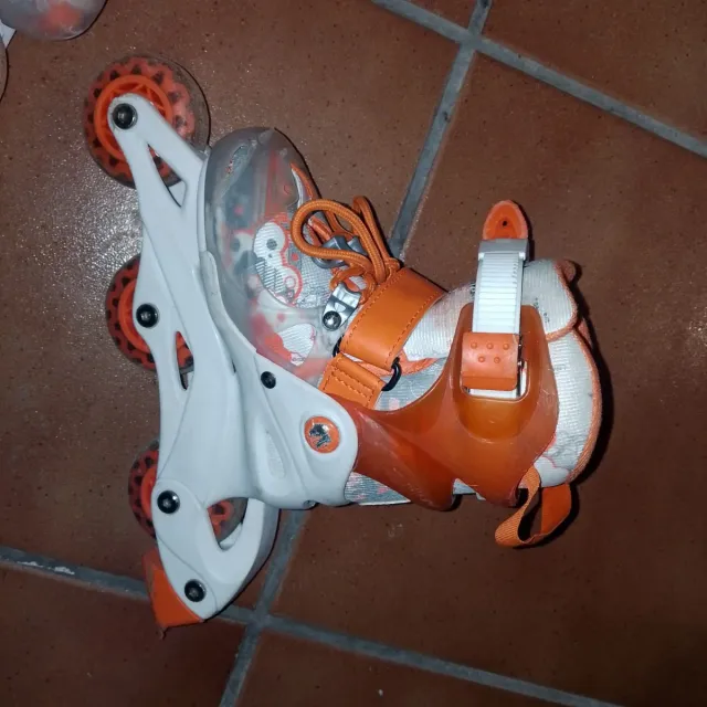 Patines infantiles ajustables naranja talla 26-29