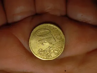 Moneda 10 céntimos 2007 error canto
