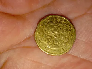 Moneda 10 céntimos 2007 error canto