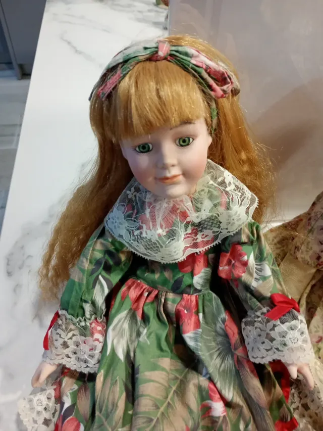 Lott di bambole in porcellana e clown