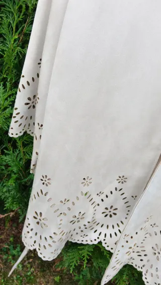 Gabardina/Chaqueta Zara troquelada beige