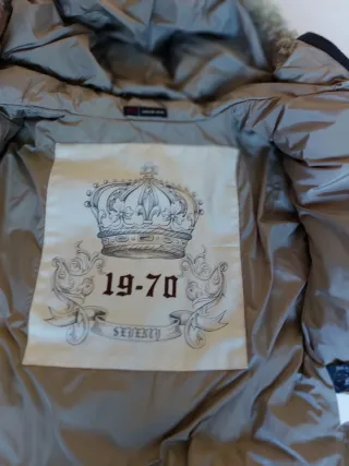 Elegante piumino Seventy 42 grigio verde