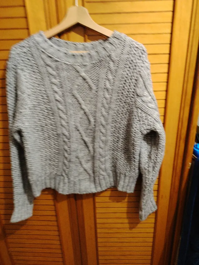 Jersey gris tejido trenzado