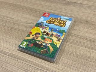 Nintendo Switch Lite Coral + Animal Crossing