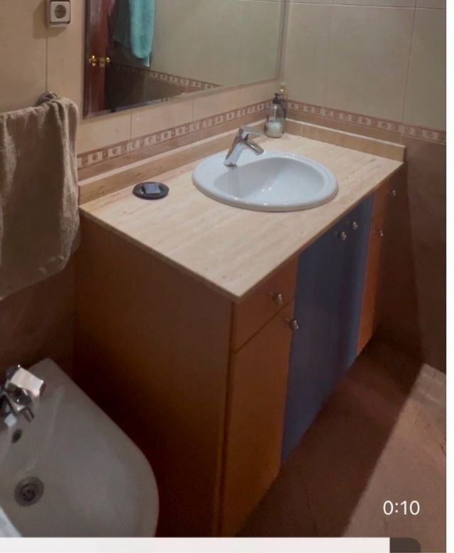 Mueble de baño piedra y madera