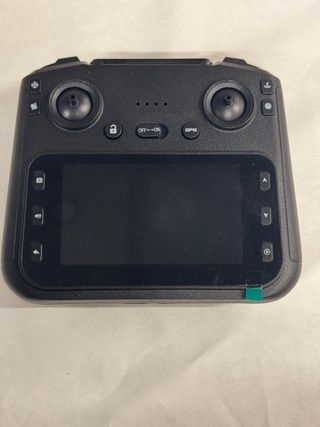 Dron con cámara gris y blanco