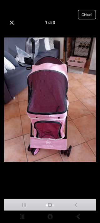 Passeggino per cani rosa