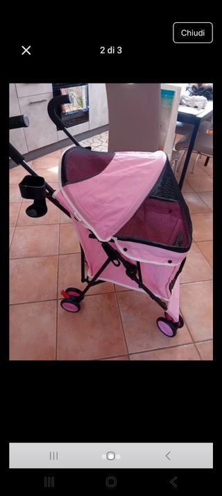 Passeggino per cani rosa