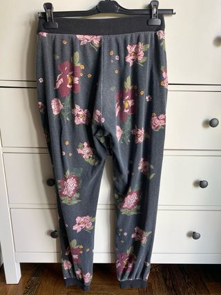 Tuta Tezenis nera con fiori rosa