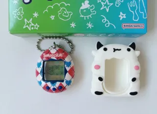 Tamagotchi® Mascota Virtual+Funda Protect Vaquita